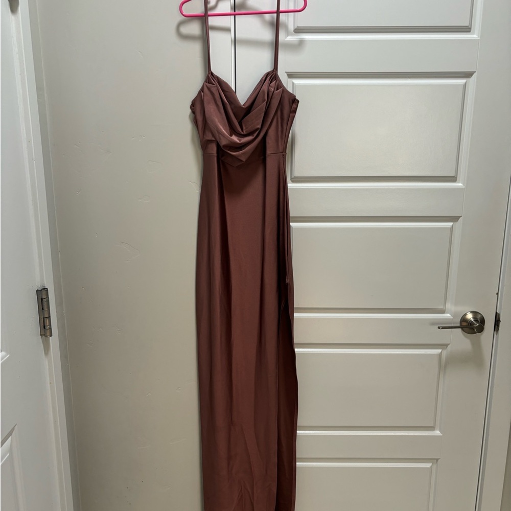 Long bodycon dress with high leg slit.